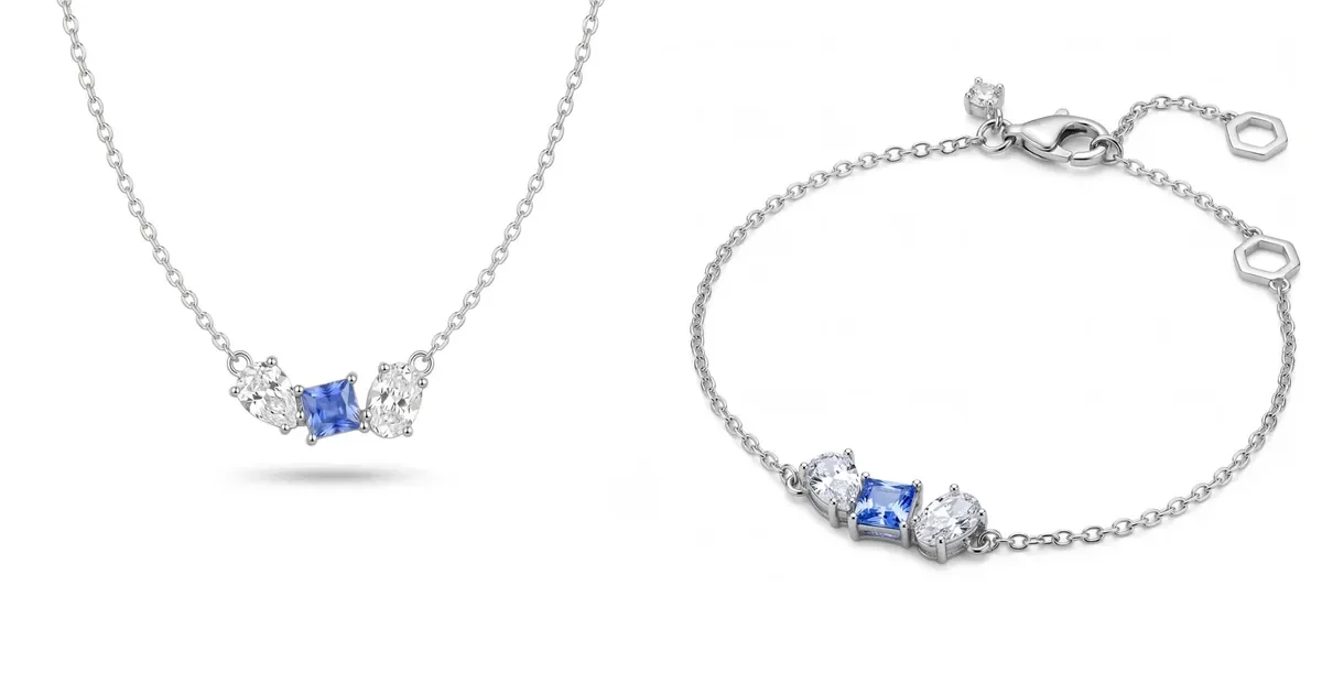 Diamond Glow Azure — srebrna ogrlica i narukvica sa azurno plavim kvadratnim kamenom i prozirnim cirkon suzama, na svetloj pozadini